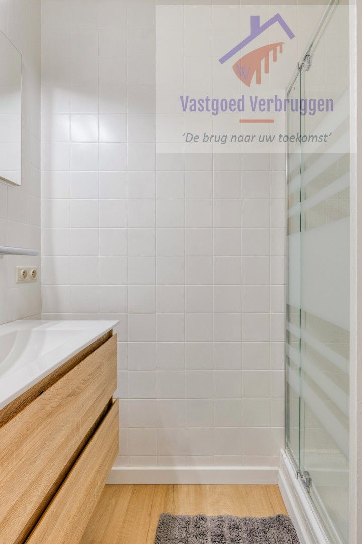 Gelijkvloers appartement met garagebox en prachtige tuin foto 8