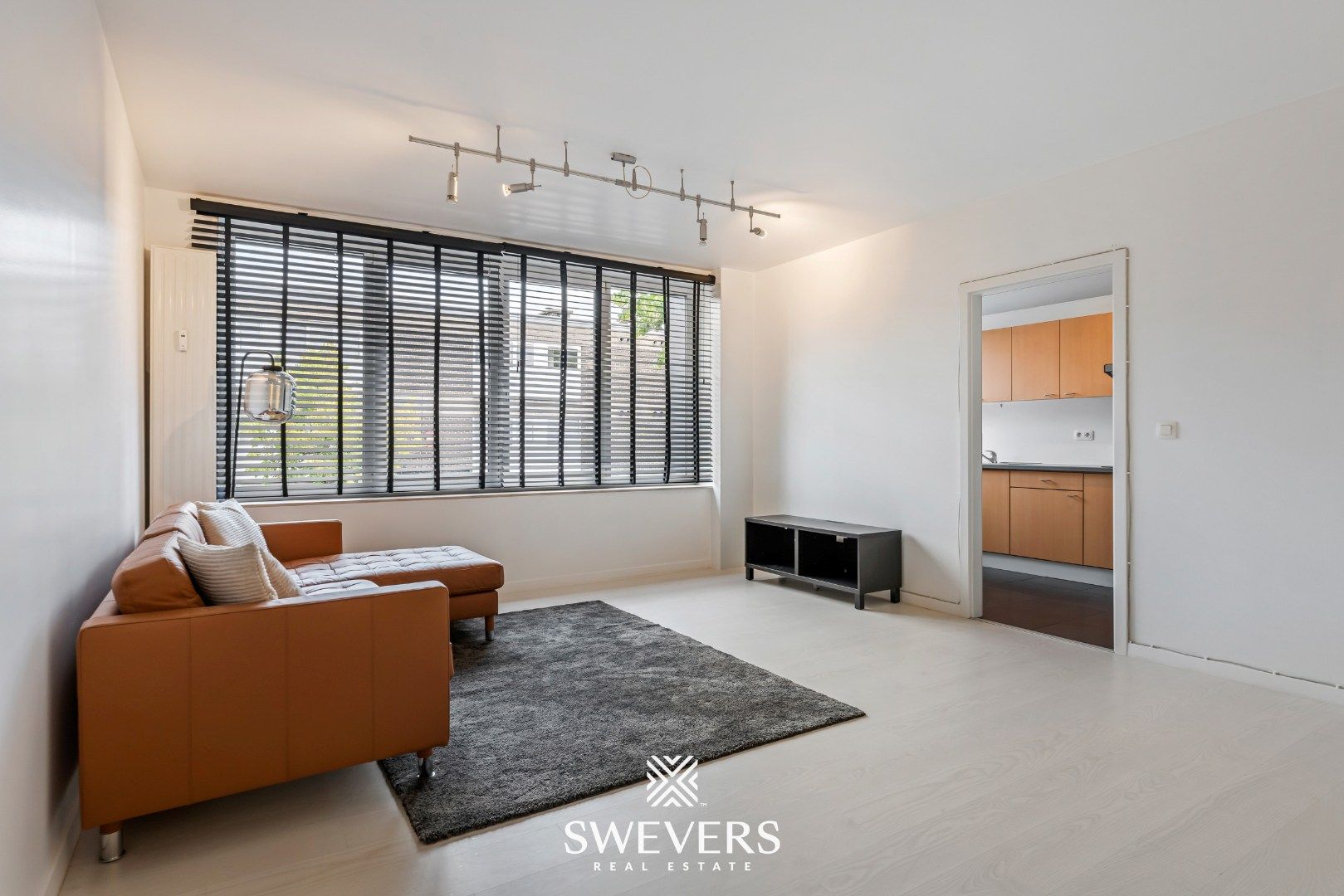 Instapklaar en energiezuinig 2-slaapkamerappartement in het centrum van Heppen foto 4