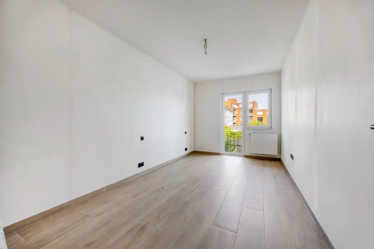 Luxueus, volledig gerenoveerd appartement met 3 slaapkamers, autostaanplaats en kelder foto 8