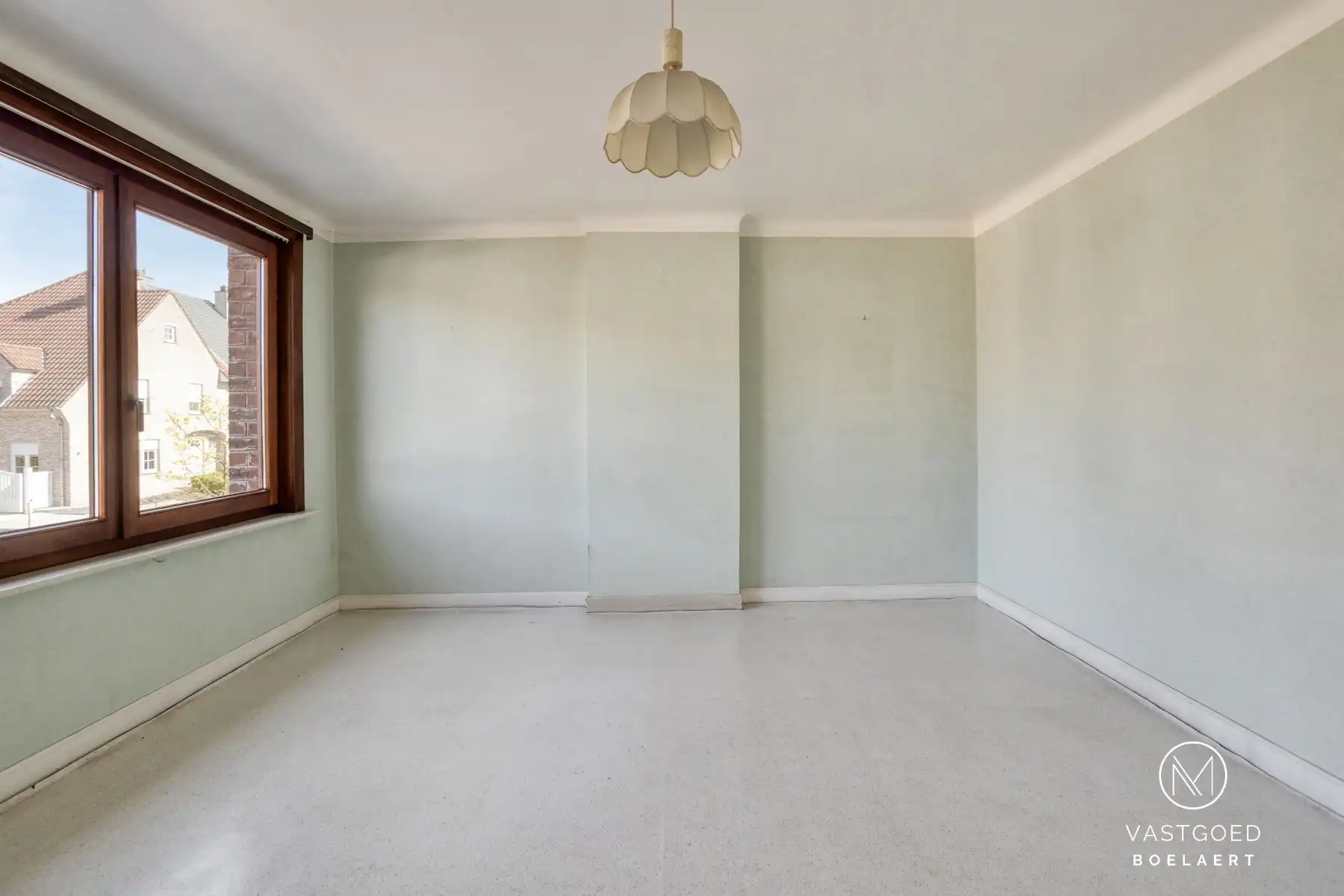 Te renoveren halfopen woning met zonnige tuin in rustige straat nabij Aalst foto 12