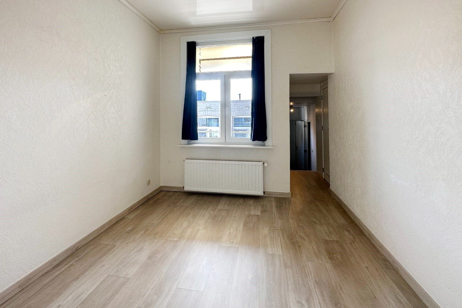 Prachtige interbellumwoning onderverdeeld in drie ruime appartementen foto 7