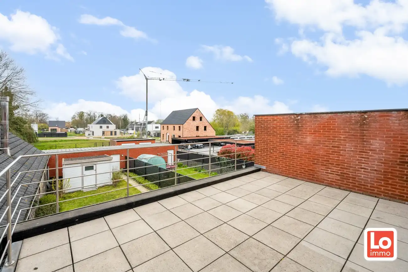 Instap klaar appartement met afzonderlijke garage én autostaanplaats in het hartje van het vernieuwde dorp van Zeveneken! foto 14