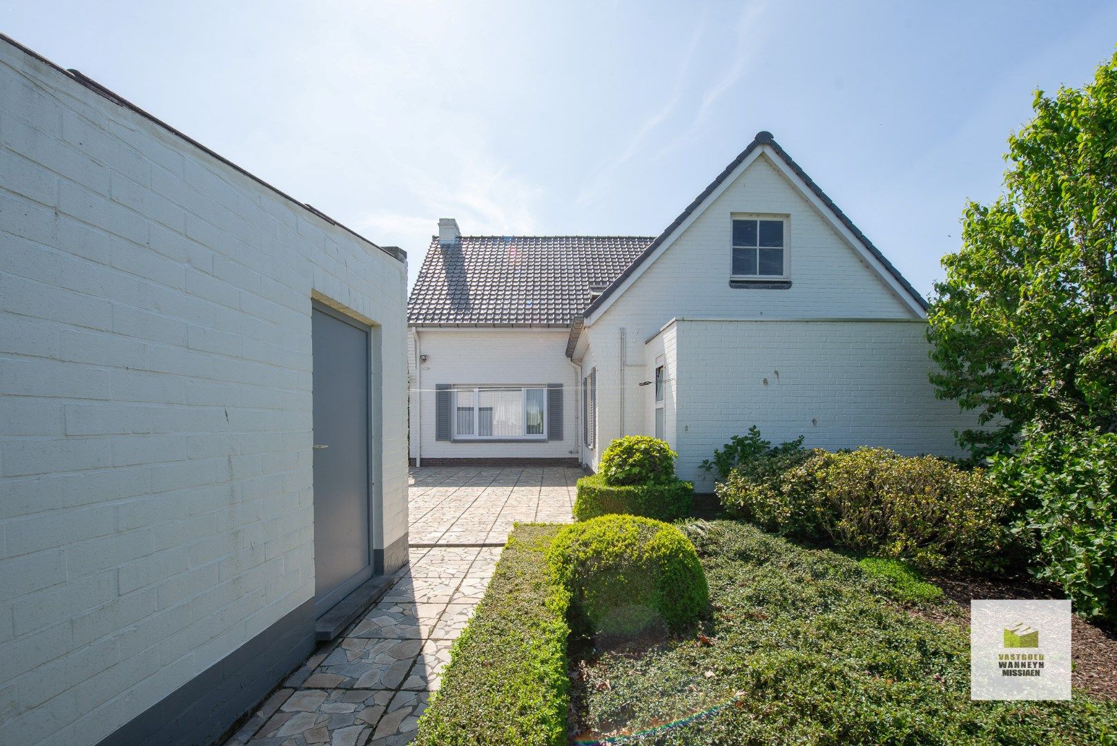 Woonhuis met 4 slaapkamers en polyvalent bijgebouw foto 9