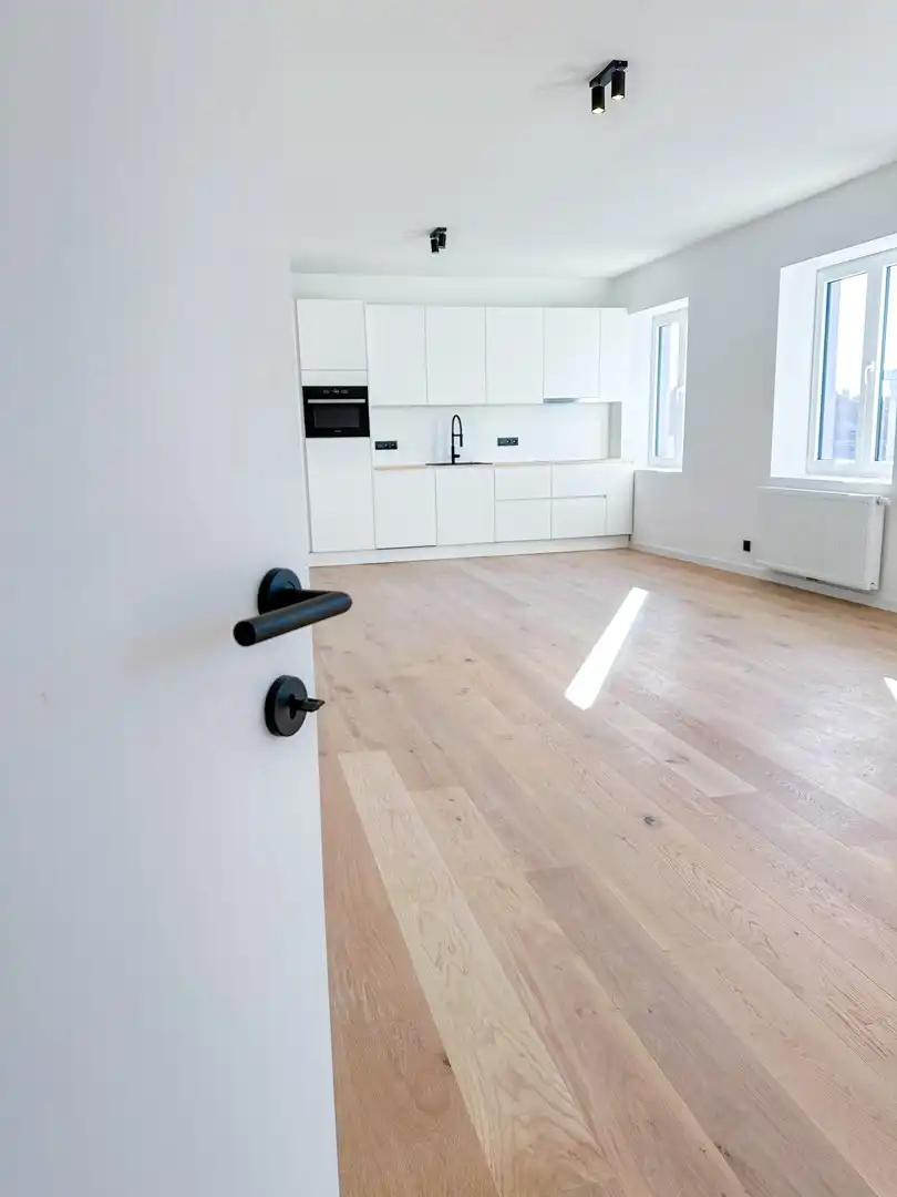 Lichtrijk, energiezuinig en ruim duplex appartement foto 9