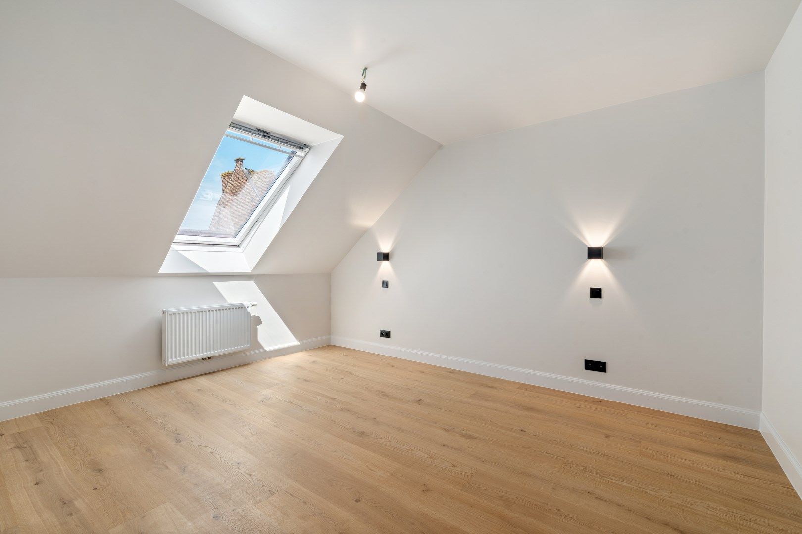 Volledig gerenoveerd duplex appartement met ruim terras en autostaanplaats foto 6