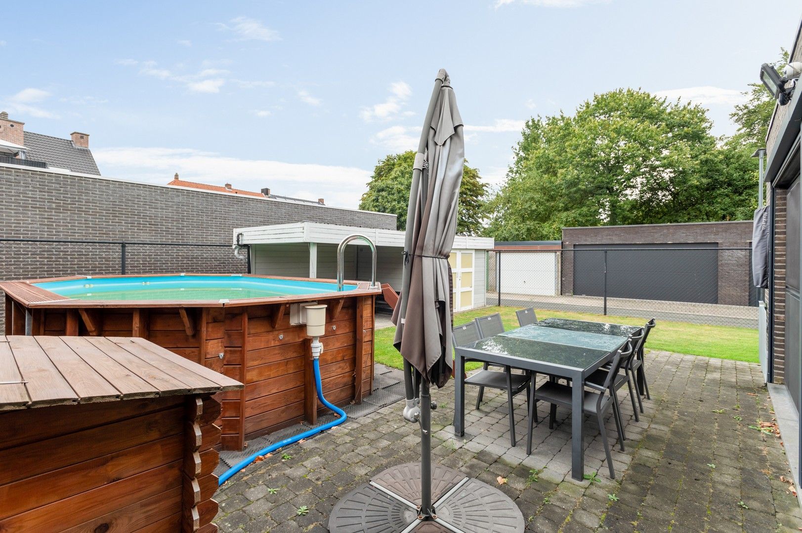 Instapklare halfopen woning met 4 slpk, tuin met zwembad foto 9