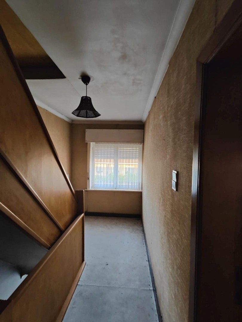Woning met loods en voormalige showroom foto 10