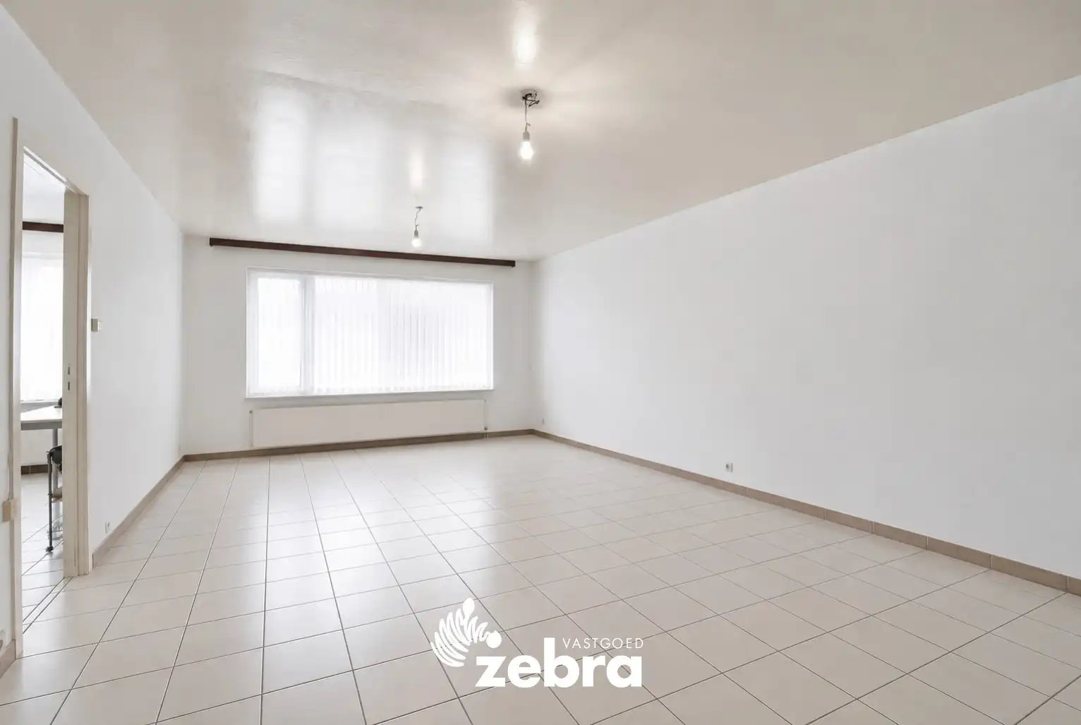 Lichtrijk appartement met 2 slaapkamers en terras – EPC D in hartje Tielt! foto 4
