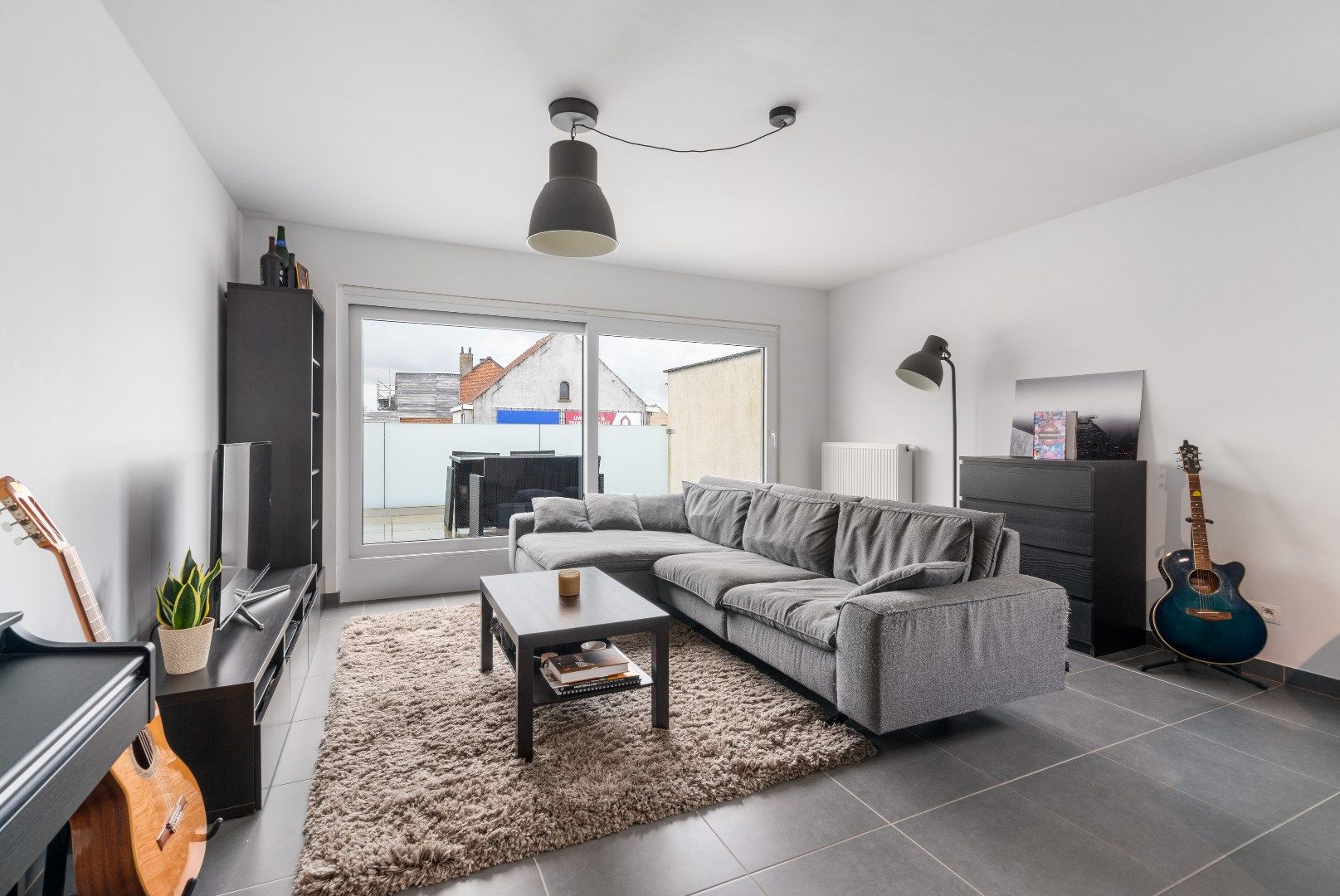 TE KOOP - gerenoveerd appartement met 2 slaapkamers op centrale ligging te Herzele foto 6