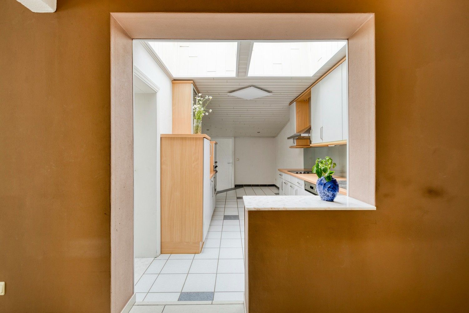 Halfopen gezinswoning met drie slaapkamers (mogelijkheid tot 4), grote tuin en zonnepanelen! foto 12