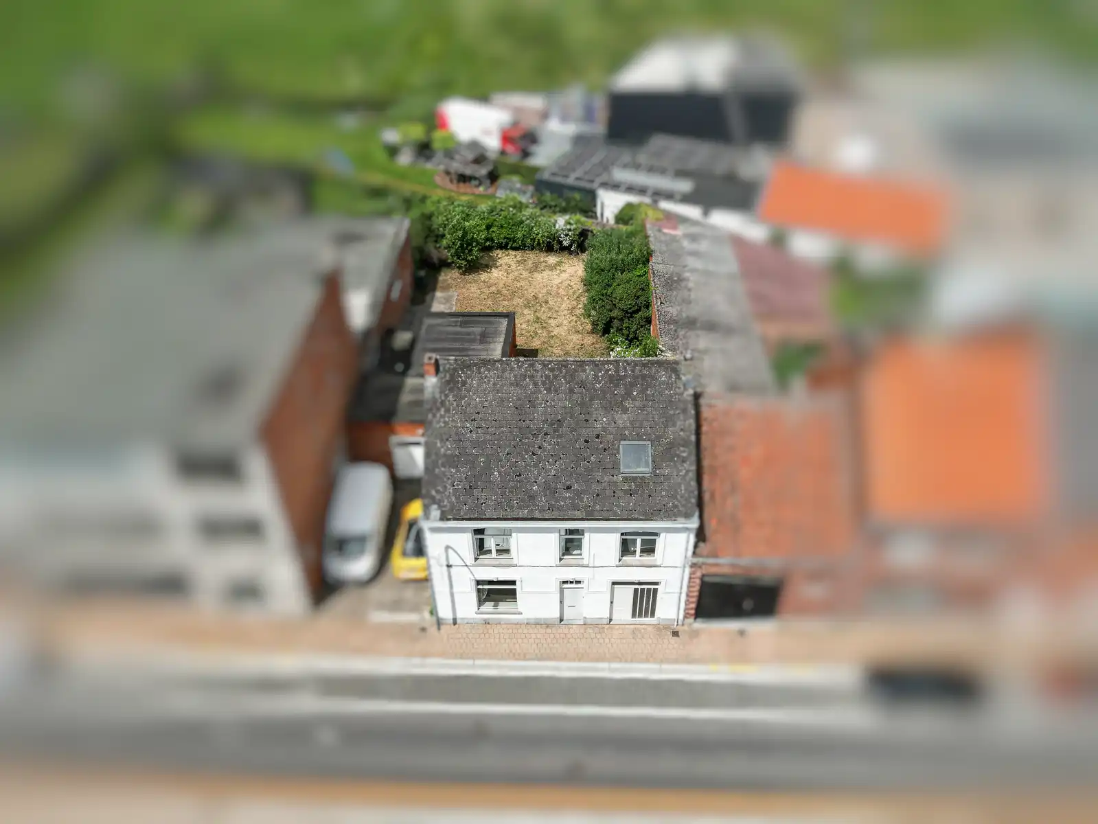 Te renoveren woning met tuin in centrum Londerzeel foto 3