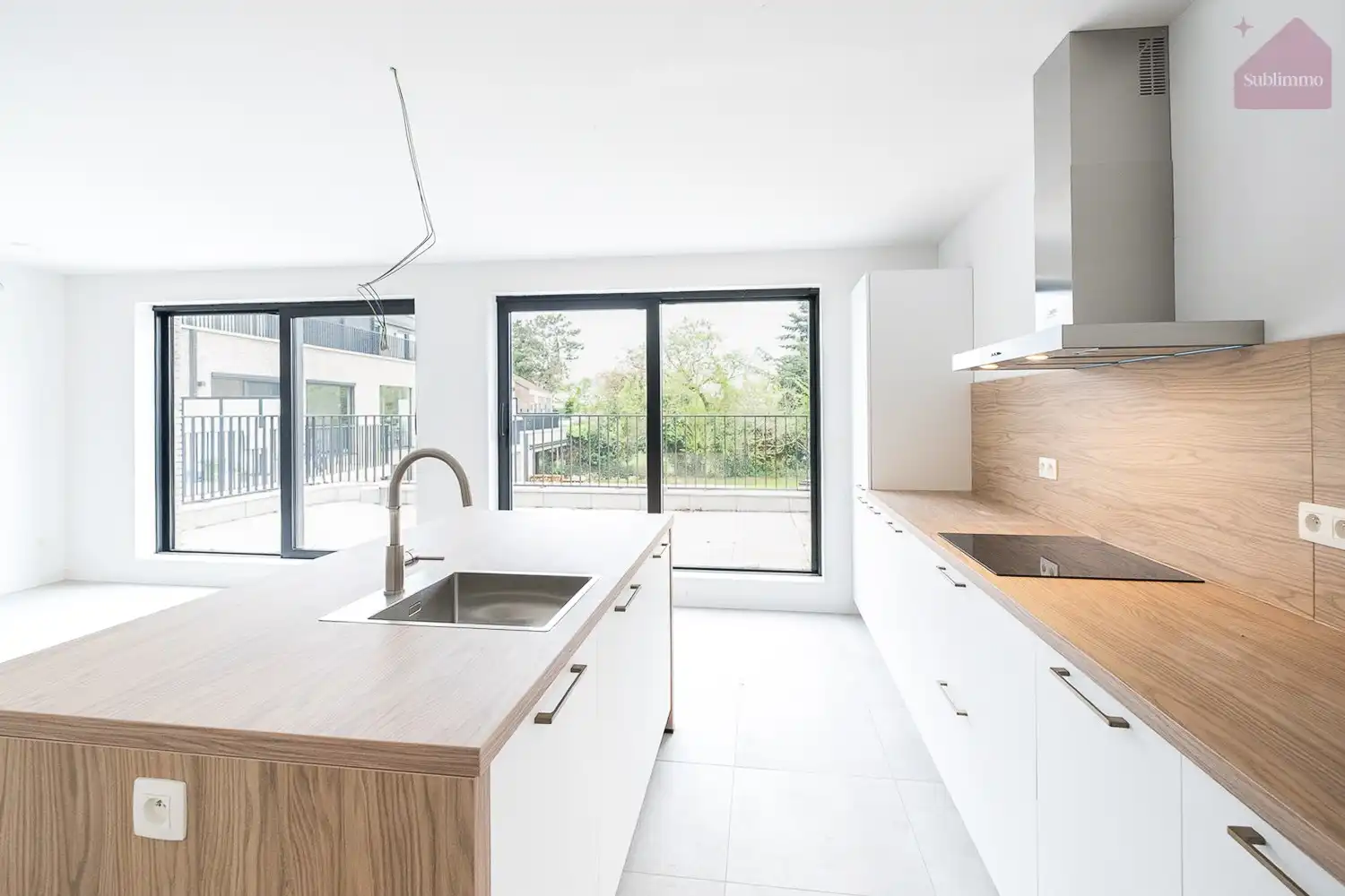 Nieuwbouwappartement op de eerste verdieping (117,80 m²) met 3 slaapkamers en terras. foto {{pictureIndex}}