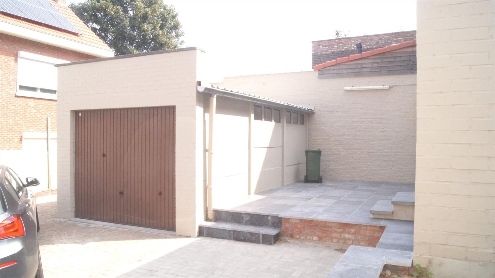 Volledig instapklare woning met 3 slpks en garage foto 3