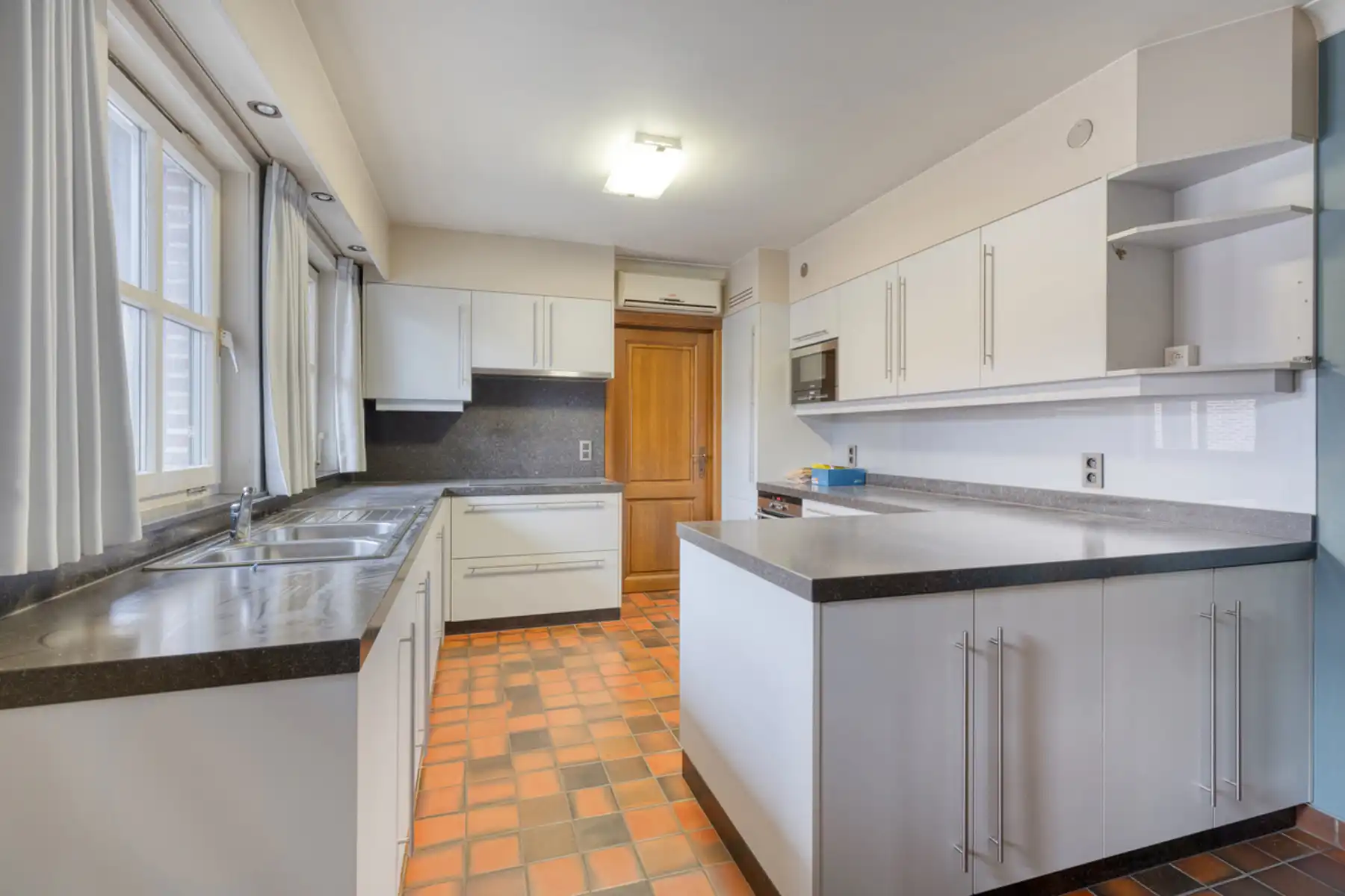 Woning met atelier en 4 slaapkamers in Buggenhout foto 13