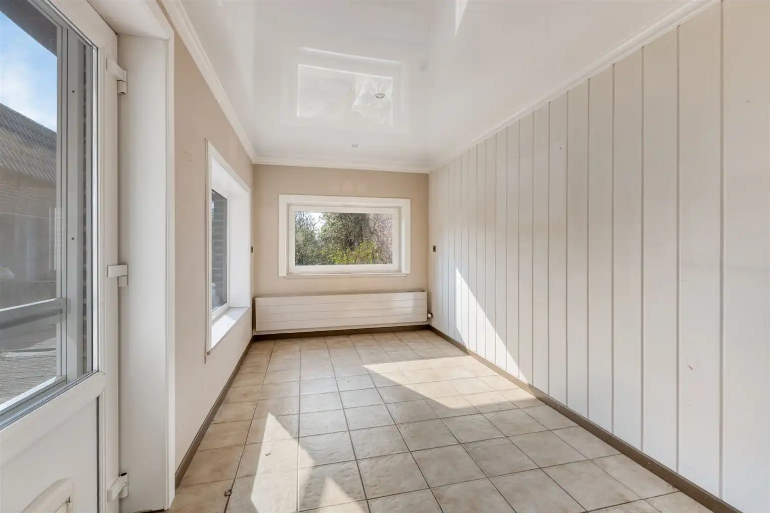 Charmante halfopen bebouwing met 3 slaapkamers, omheinde tuin en zonnepanelen, gunstig gelegen nabij het centrum van Maaseik. foto 12