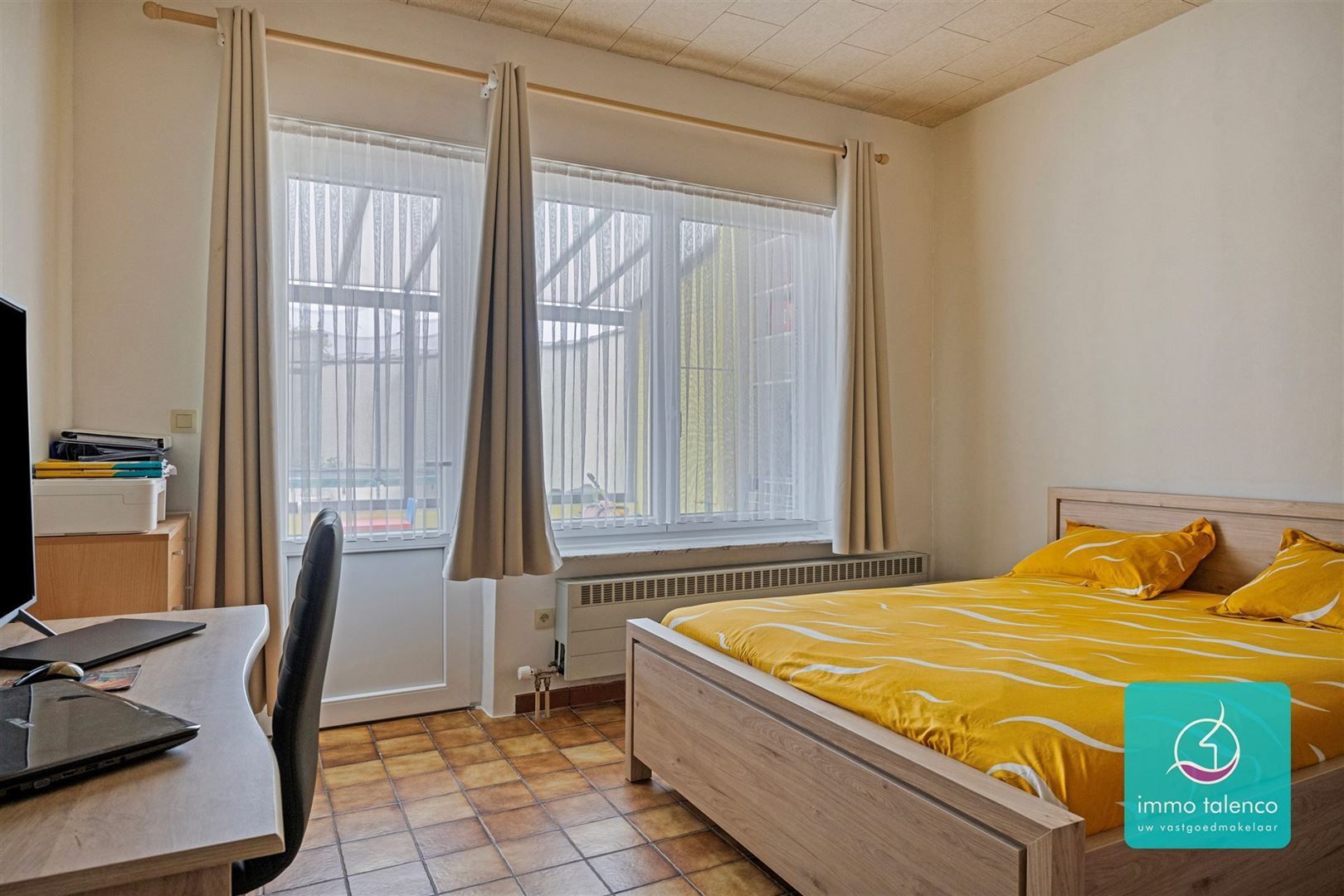 Ruim gelijkvloers appartement met 3 slaapkamers foto 14