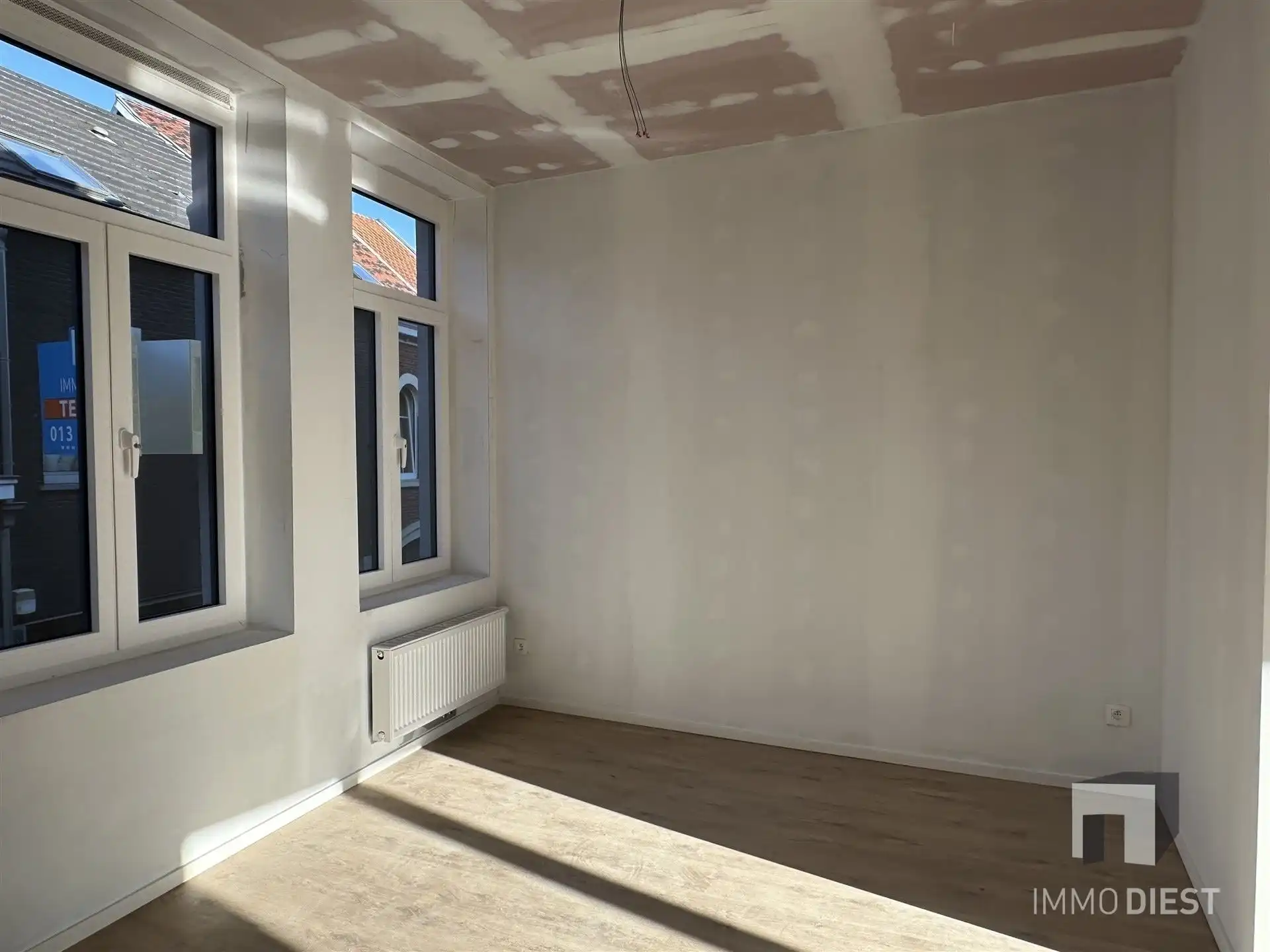 Opbrengsteigendom - 3 gloednieuwe appartementen + 1 handelspand foto 21