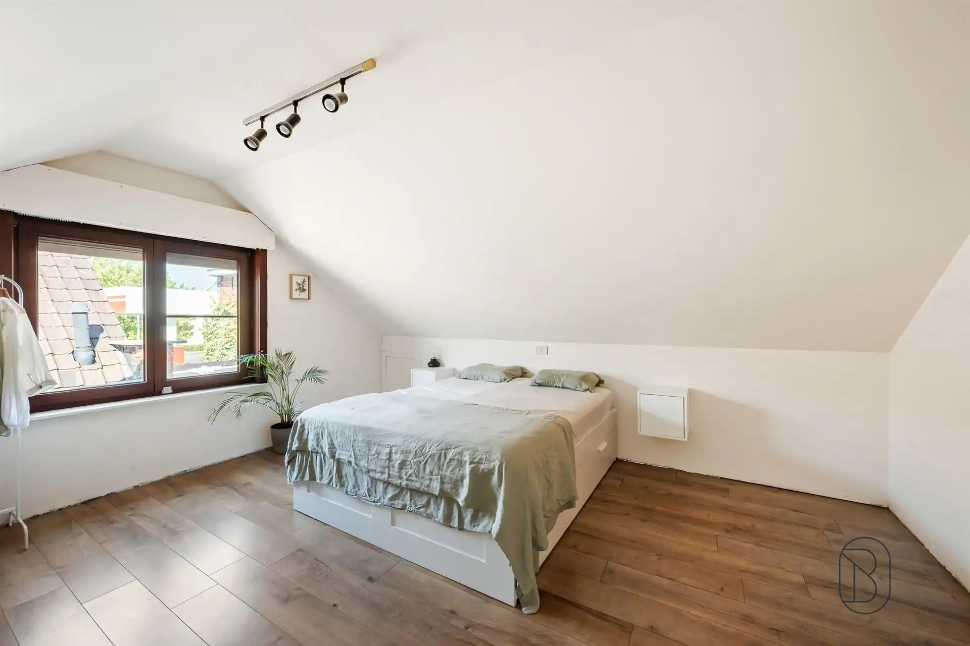 Instapklare woning met grote aangename tuin.  foto 11