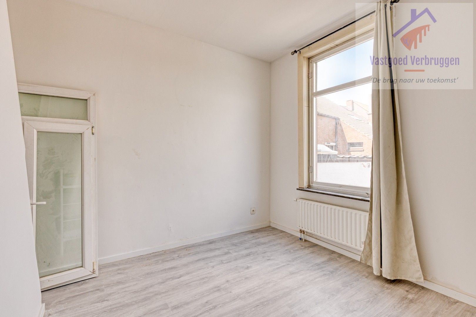 Grotendeels gerenoveerde woning met 4 slaapkamers in centrum Aalst foto 7