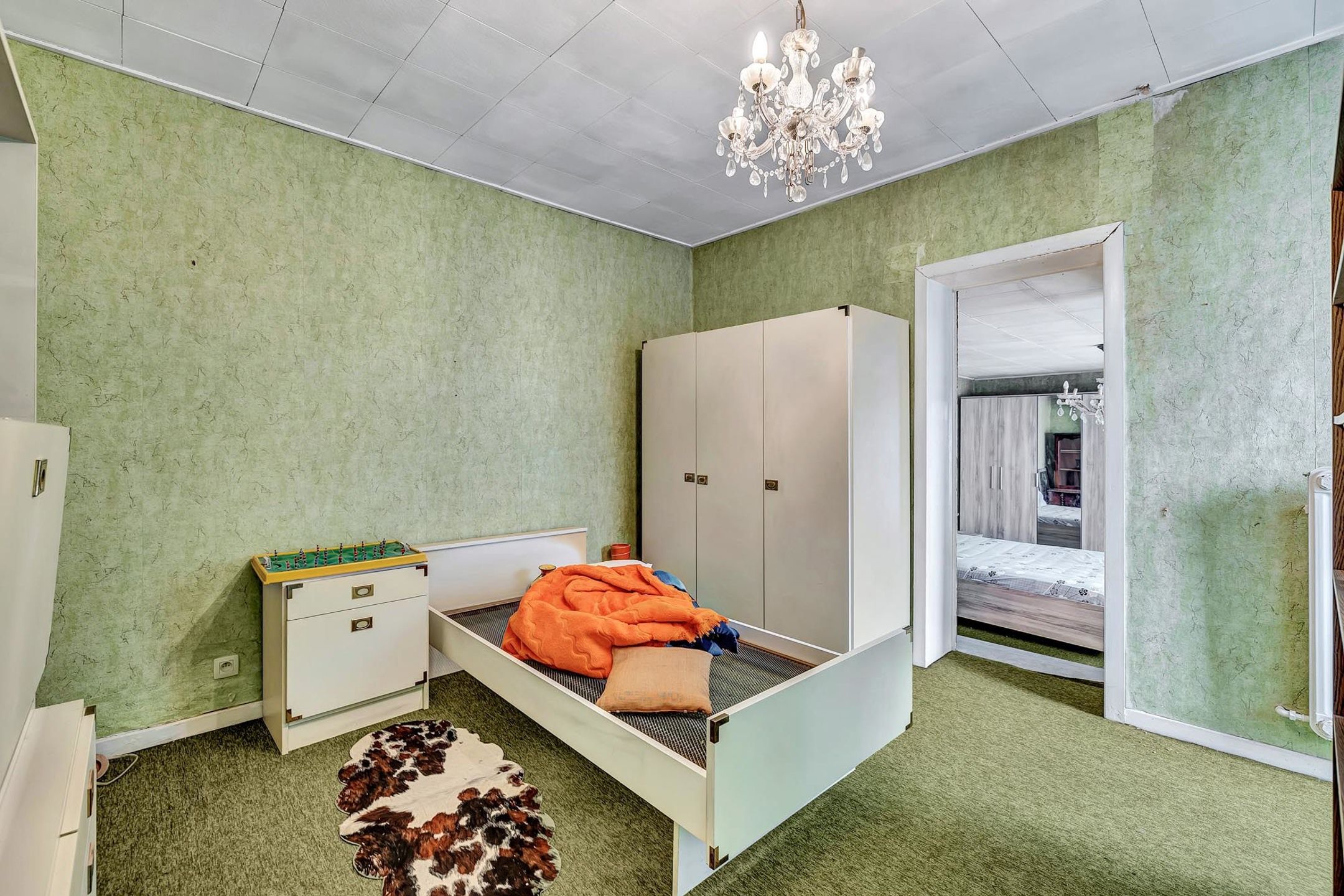 Te renoveren woning met ruime garage en tuin foto 18