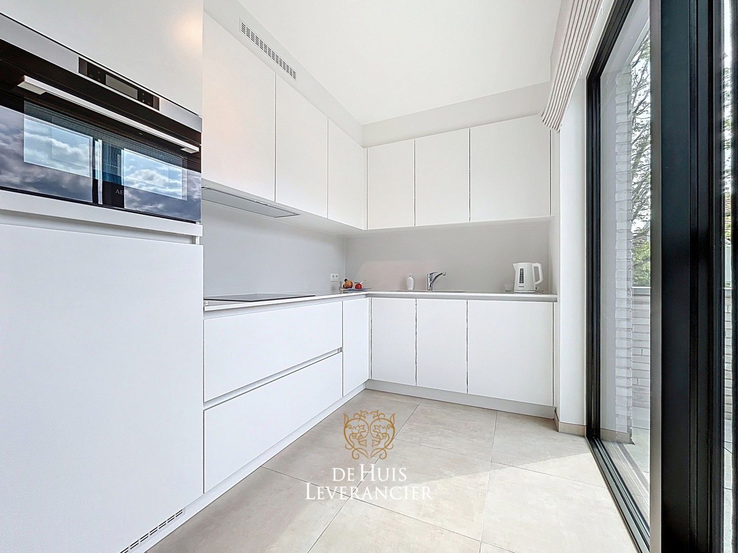 Discrete luxe & tijdloze elegantie : subliem nieuwbouwappartement met terras en gemeenschappelijk tuin te koop in Boechout foto 6