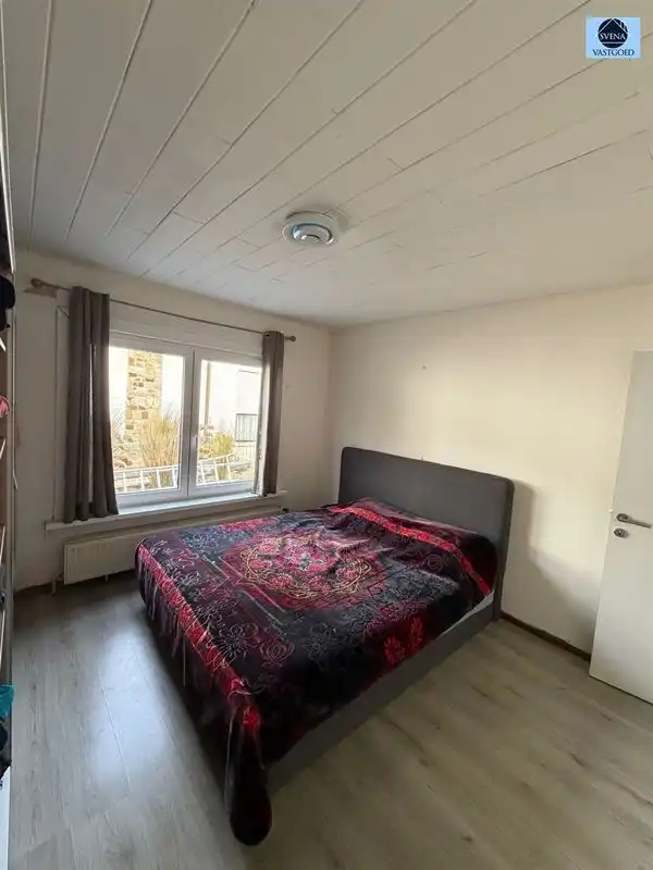 WONING MET HANDELSRUIMTE EN 3 SLAAPKAMERS foto 11