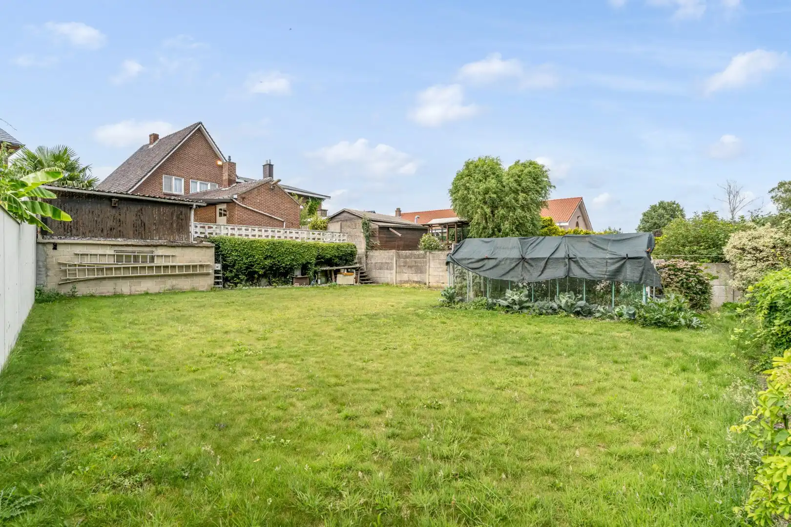 Halfvrijstaande gezinswoning op een ruim perceel van 13a80ca op wandelafstand van het centrum van Opoeteren! foto 32
