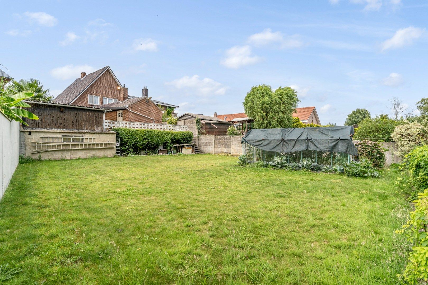 Halfvrijstaande gezinswoning op een ruim perceel van 13a80ca op wandelafstand van het centrum van Opoeteren! foto 32