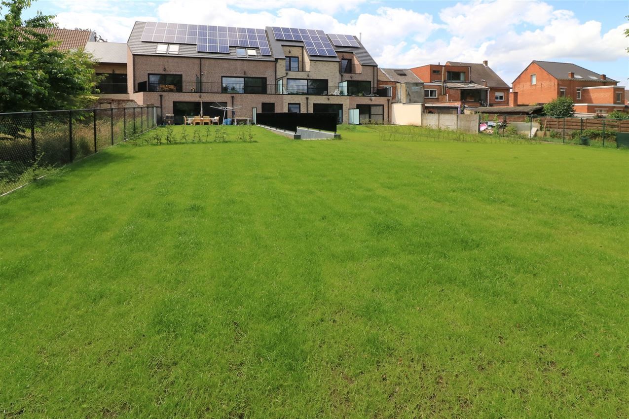 Nieuwbouw gelijkvloers appartement met tuintje foto {{pictureIndex}}