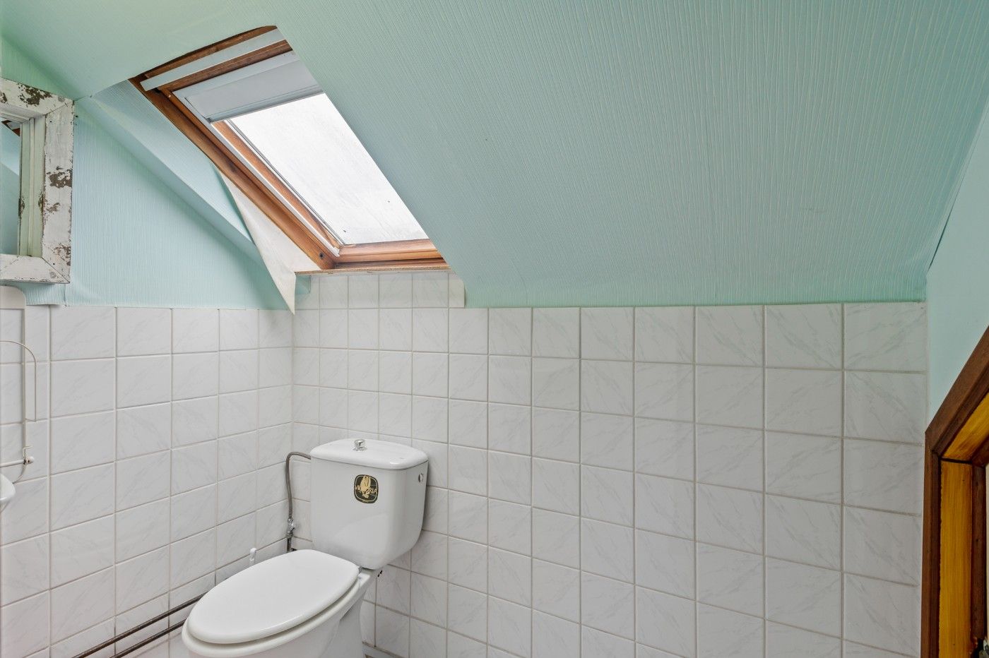 Te renoveren bel-etagewoning met 3 slpk., inpandige garage en tuin foto 18