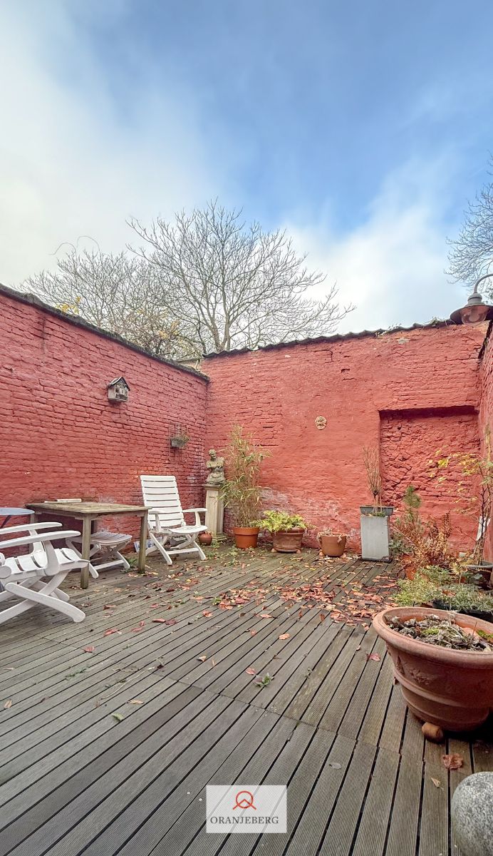 Huis met tuintje vlakbij Coupure foto {{pictureIndex}}