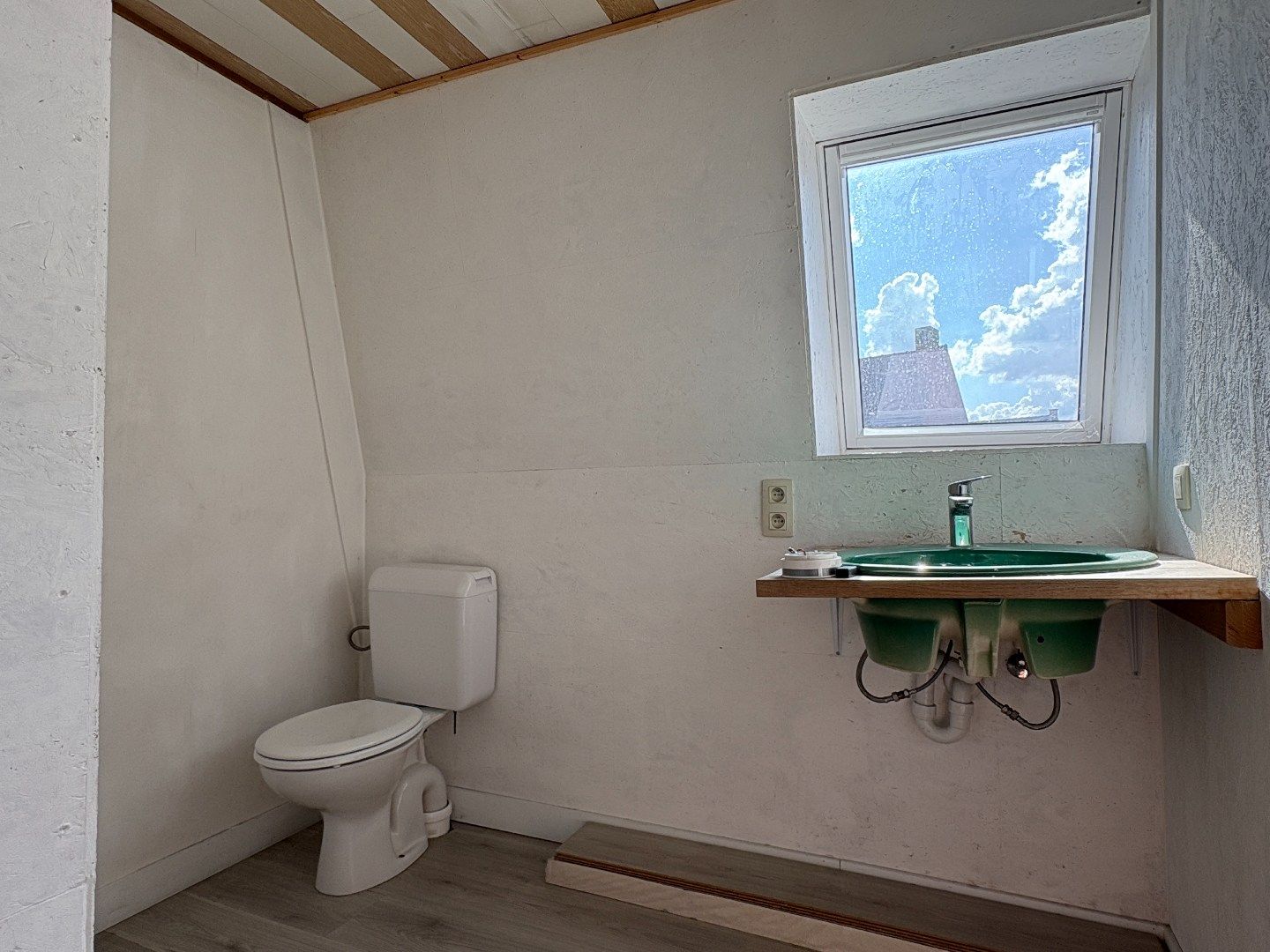 Centraal gelegen woning met goed georiënteerde tuin en 3 slaapkamers. foto 13