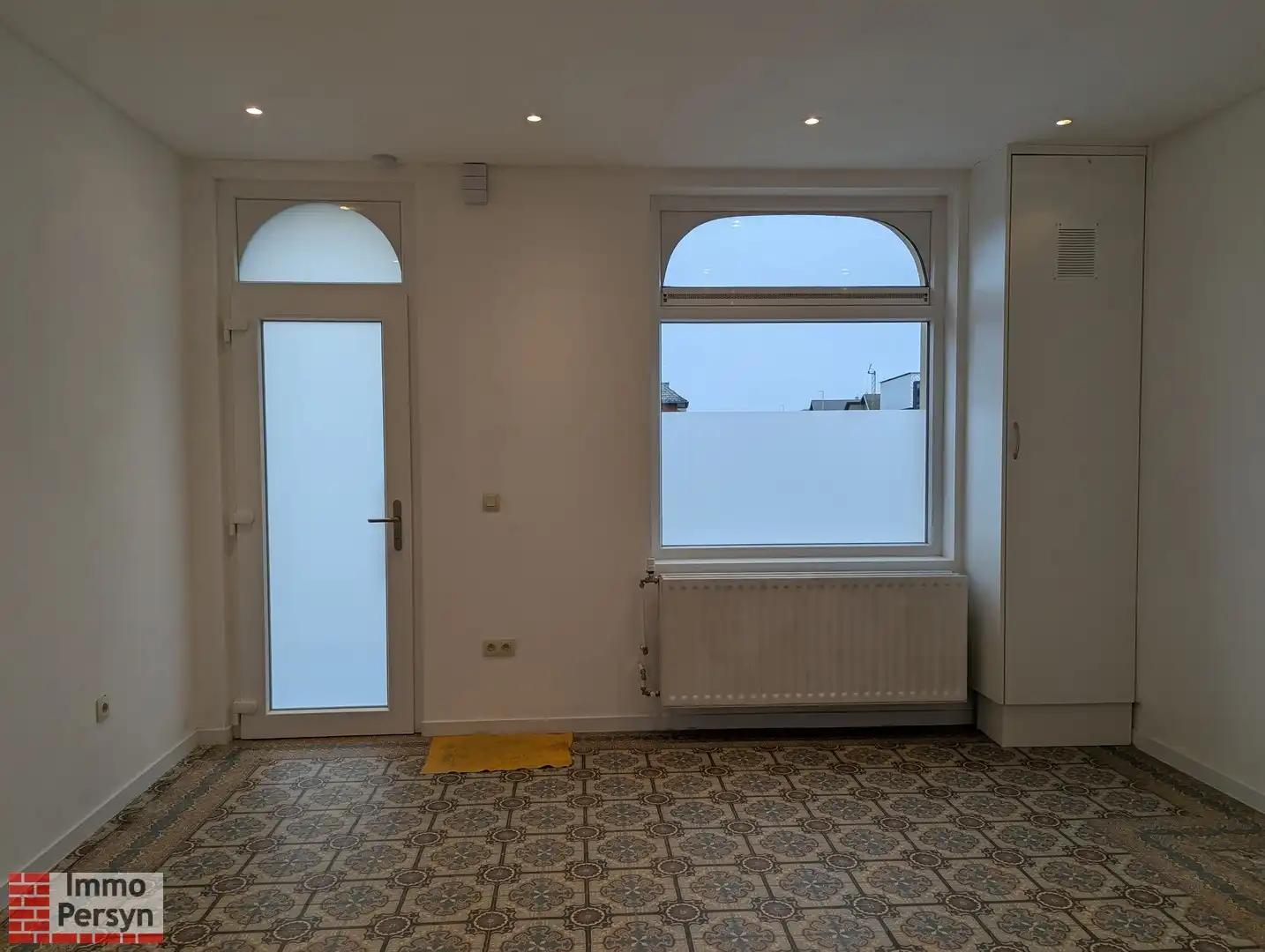 Rustig gelegen gezinswoning met tuintje foto 2