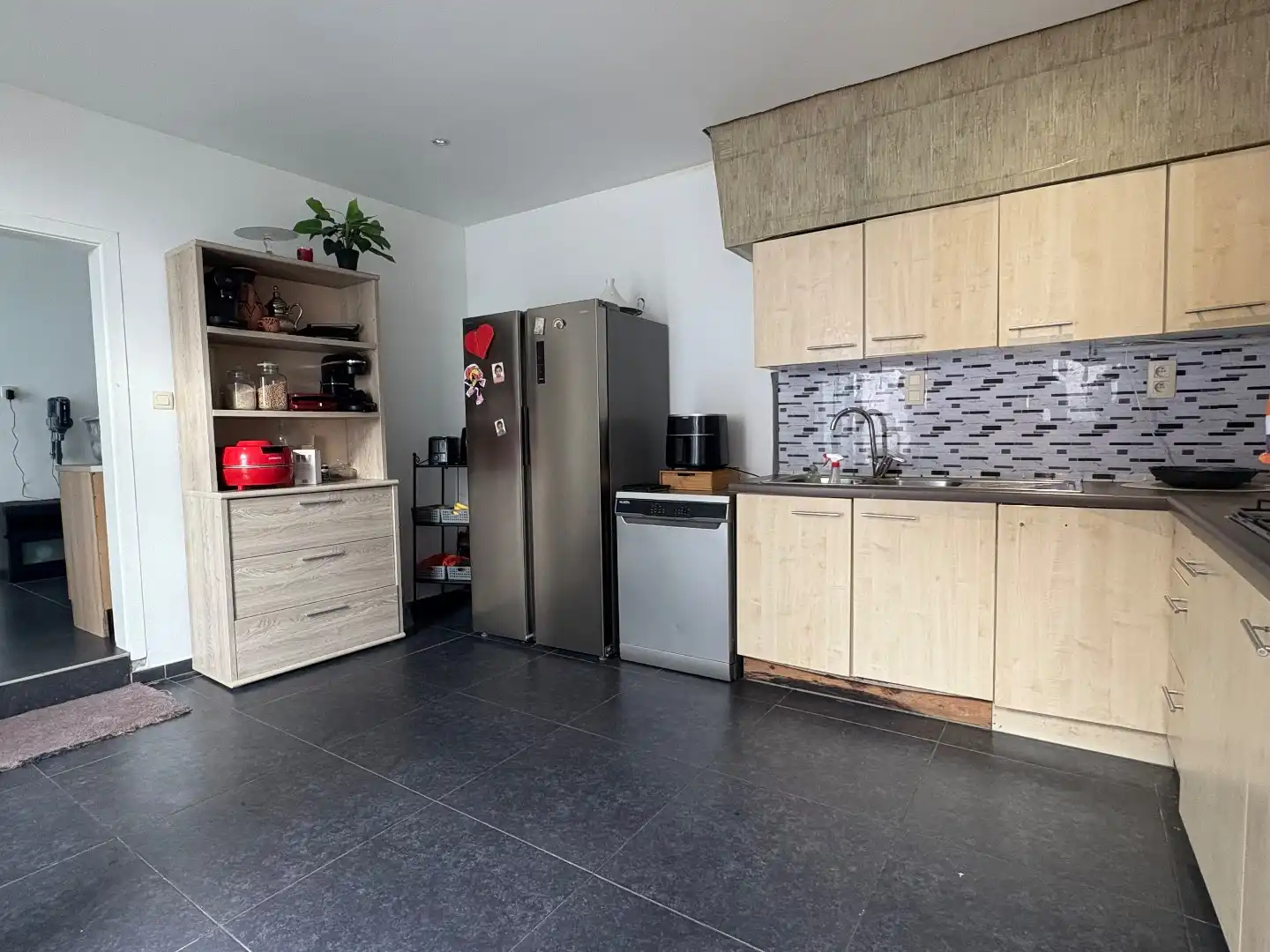 Halfopen woning te koop met 3 slaapkamers en veel ruimte in Heule foto 3