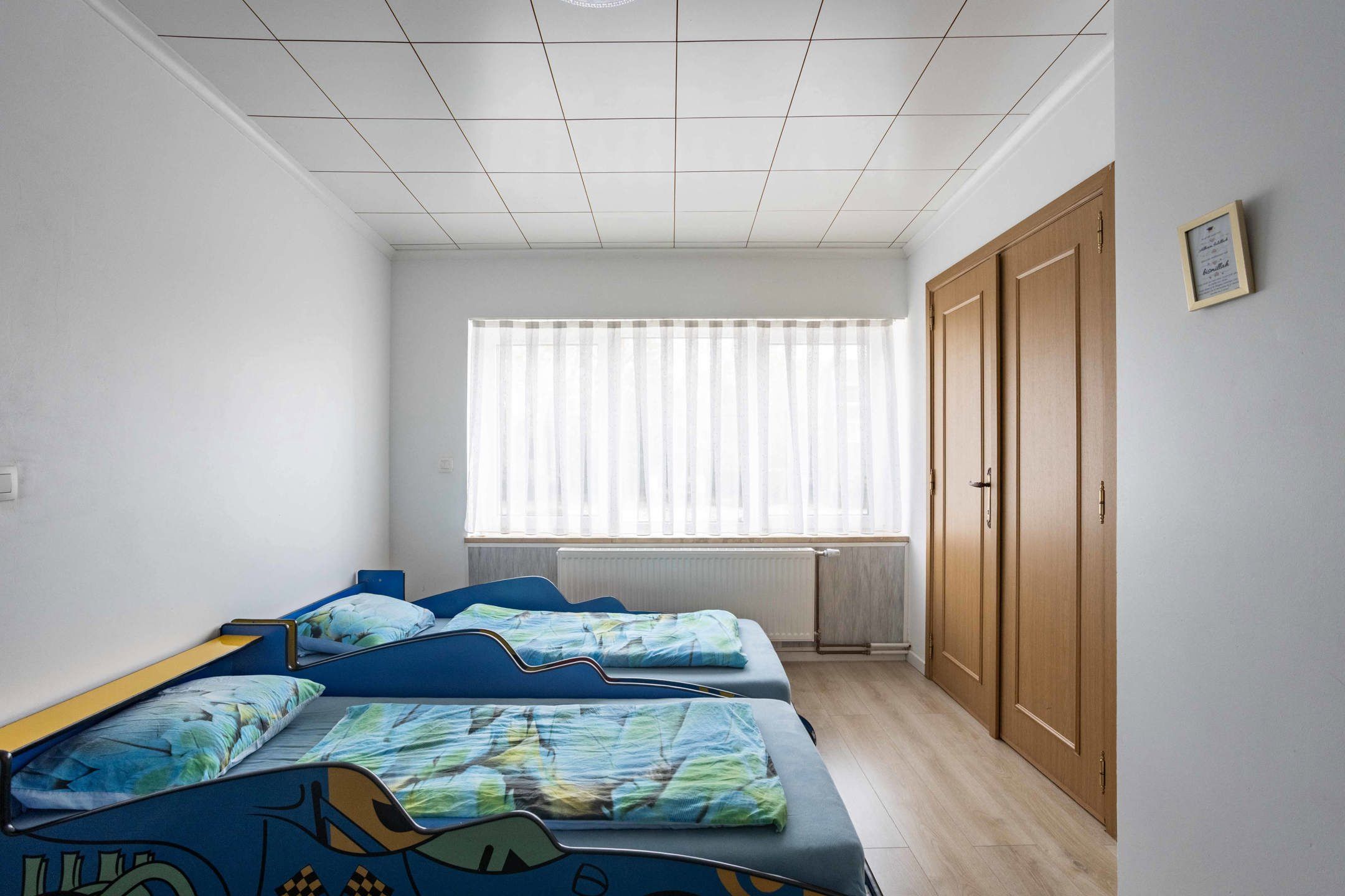 Gezinswoning met 4 slaapkamers, tuin en achteruitweg  foto 15