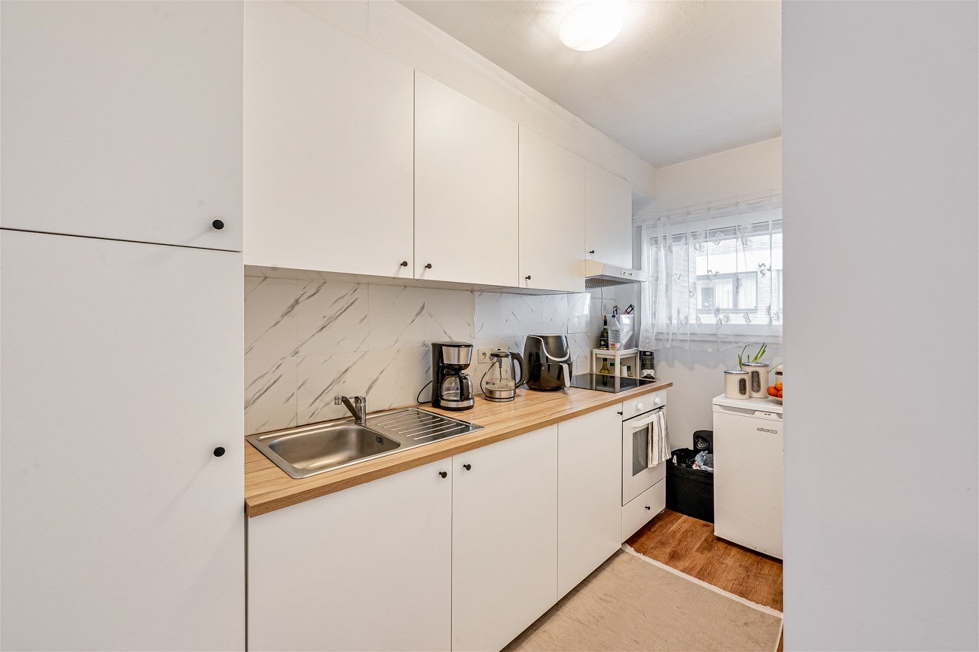 Centraal gelegen appartement met 2 slaapkamers op de eerste verdieping foto 4