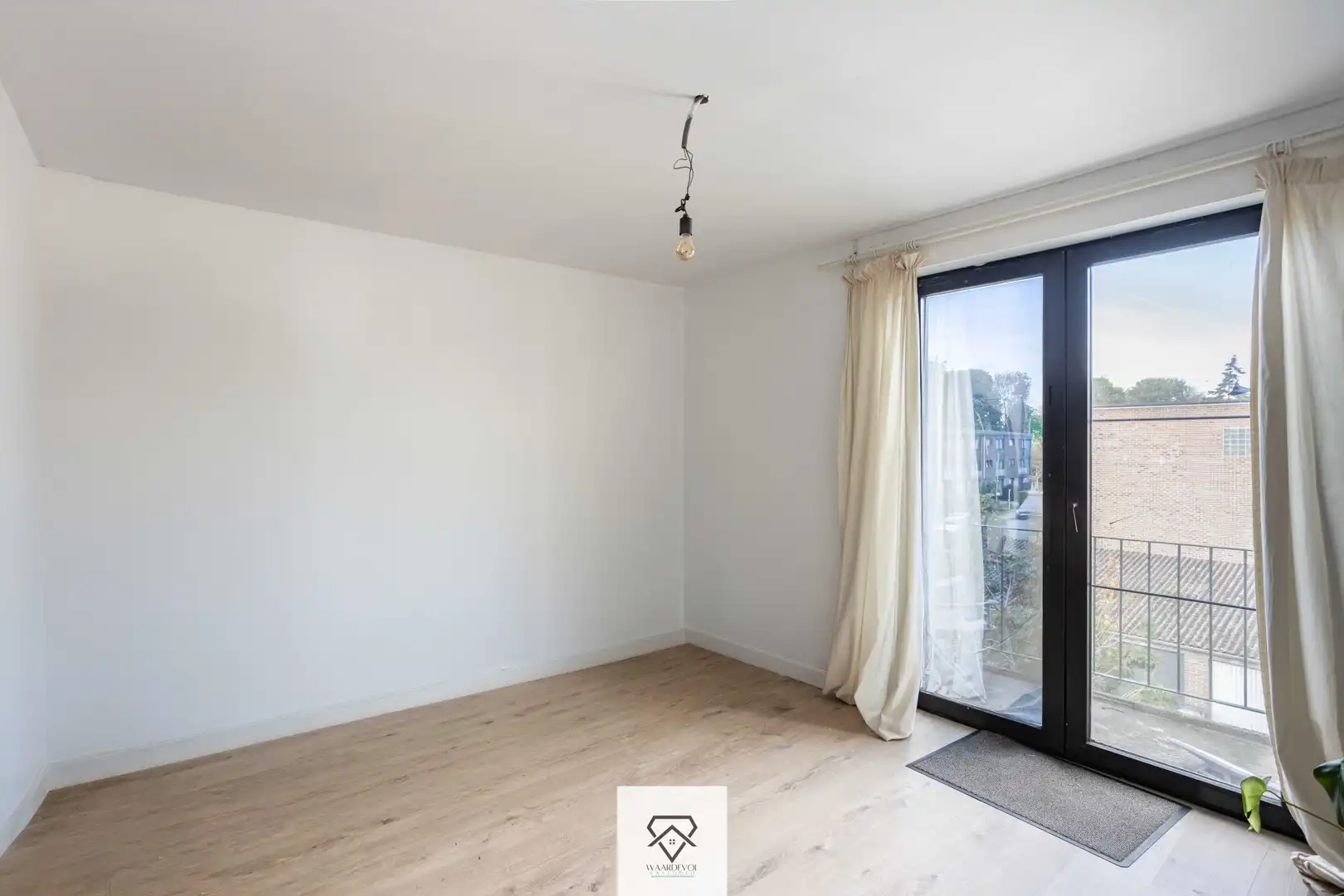 Knap gerenoveerd 2-slaapkamerappartement met zonnig terras in Wondelgem foto 14