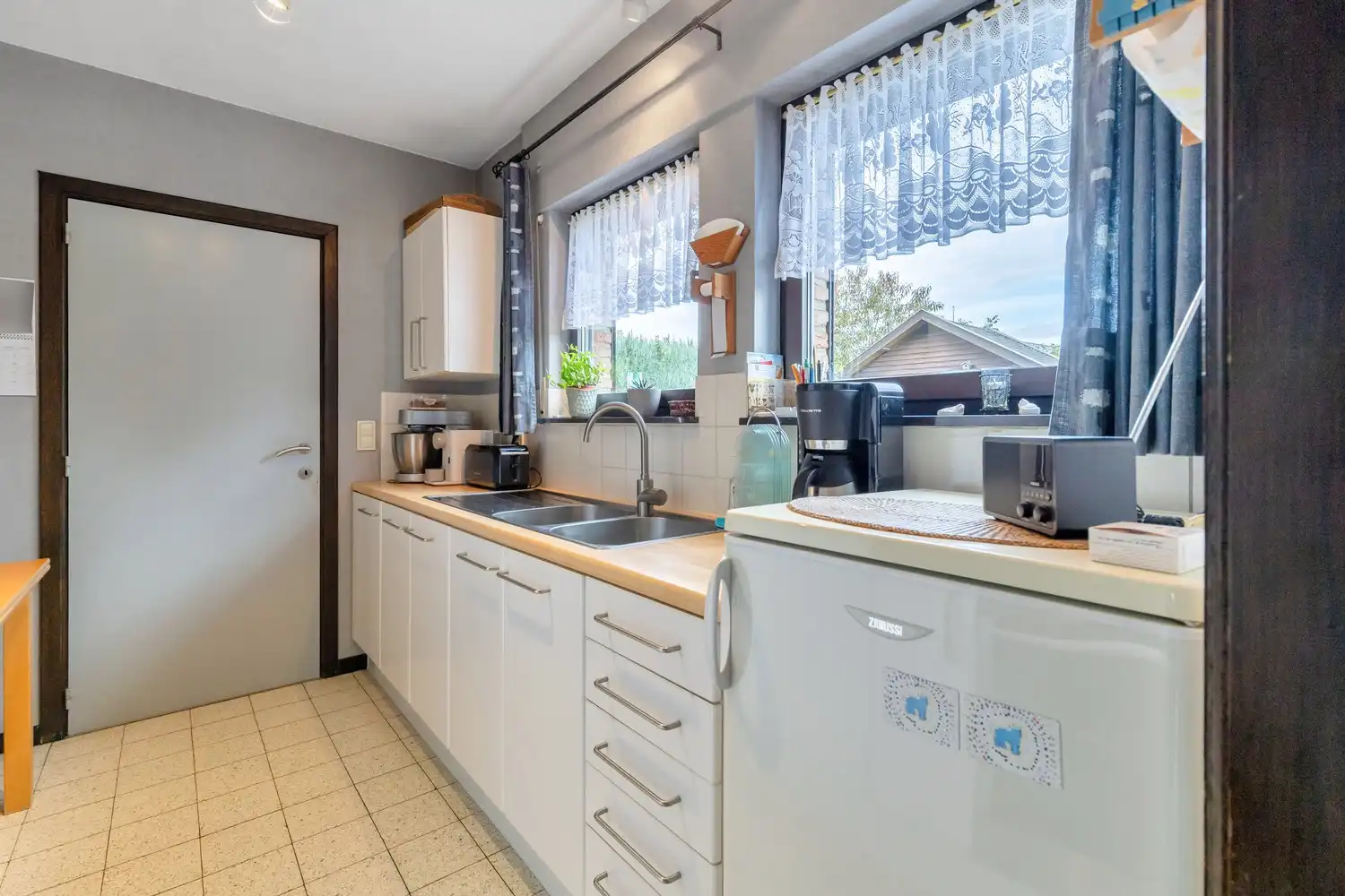 Verzorgde, op te frissen gezinswoning met 4 slaapkamers en gezellige tuin in Gellik, Lanaken! foto 12