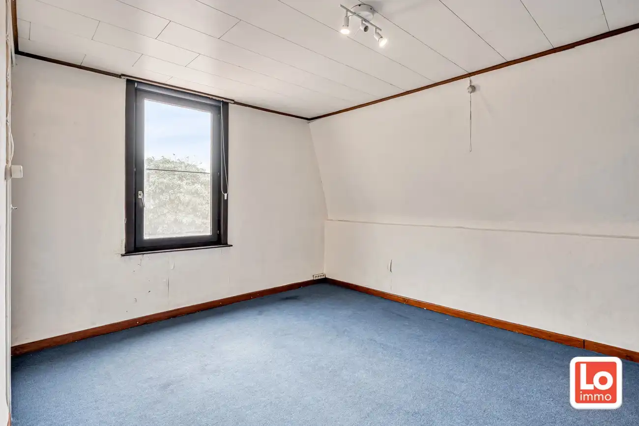 Leuke halfopen starterswoning met afzonderlijke garage en koertje op landelijke locatie in Mendonk. foto 12