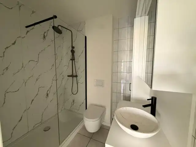 Prachtig appartement met 2 slaapkamers, terras en garage in het centrum van Dilsen foto 14