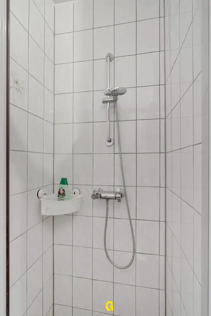 Uitstekend verzorgd 2-slaapkamer appartement in hartje Bilzen, met standplaats, kelderberging en terras met zicht op het Park van Haffmans foto 26