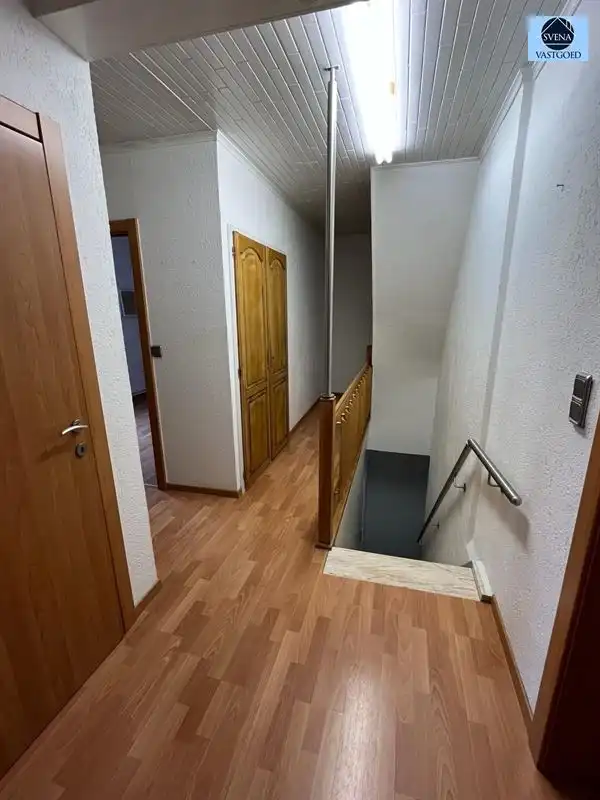 HANDELSHUIS EN APPARTEMENT MET 5 SLAAPKAMERS foto 6