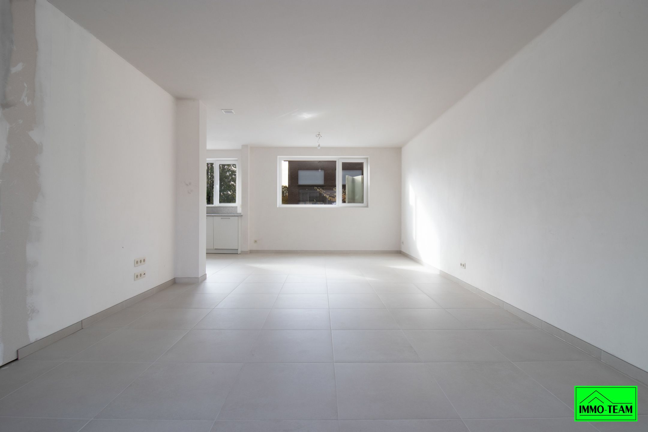 Nieuwbouw gelijkvloers appartement met terras en garage.  foto 8