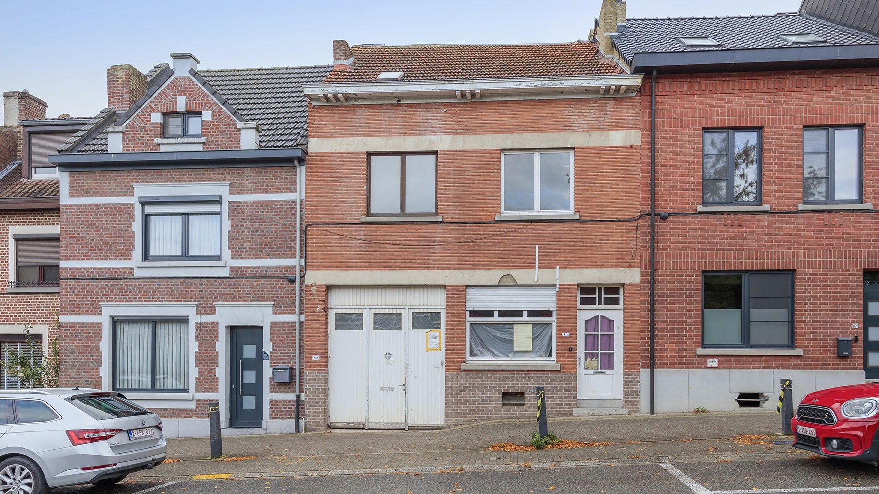 Af te werken rijwoning in centrum Tienen foto 1