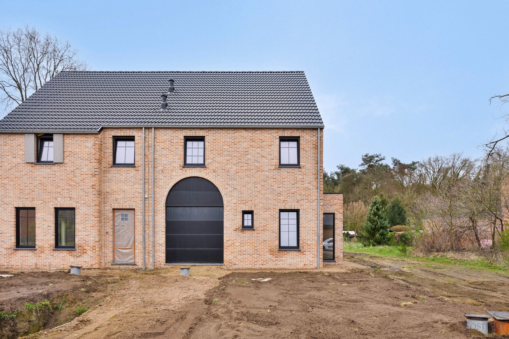Nieuwbouw BEN-woning met prachtige tuin in centrum Oostham foto {{pictureIndex}}