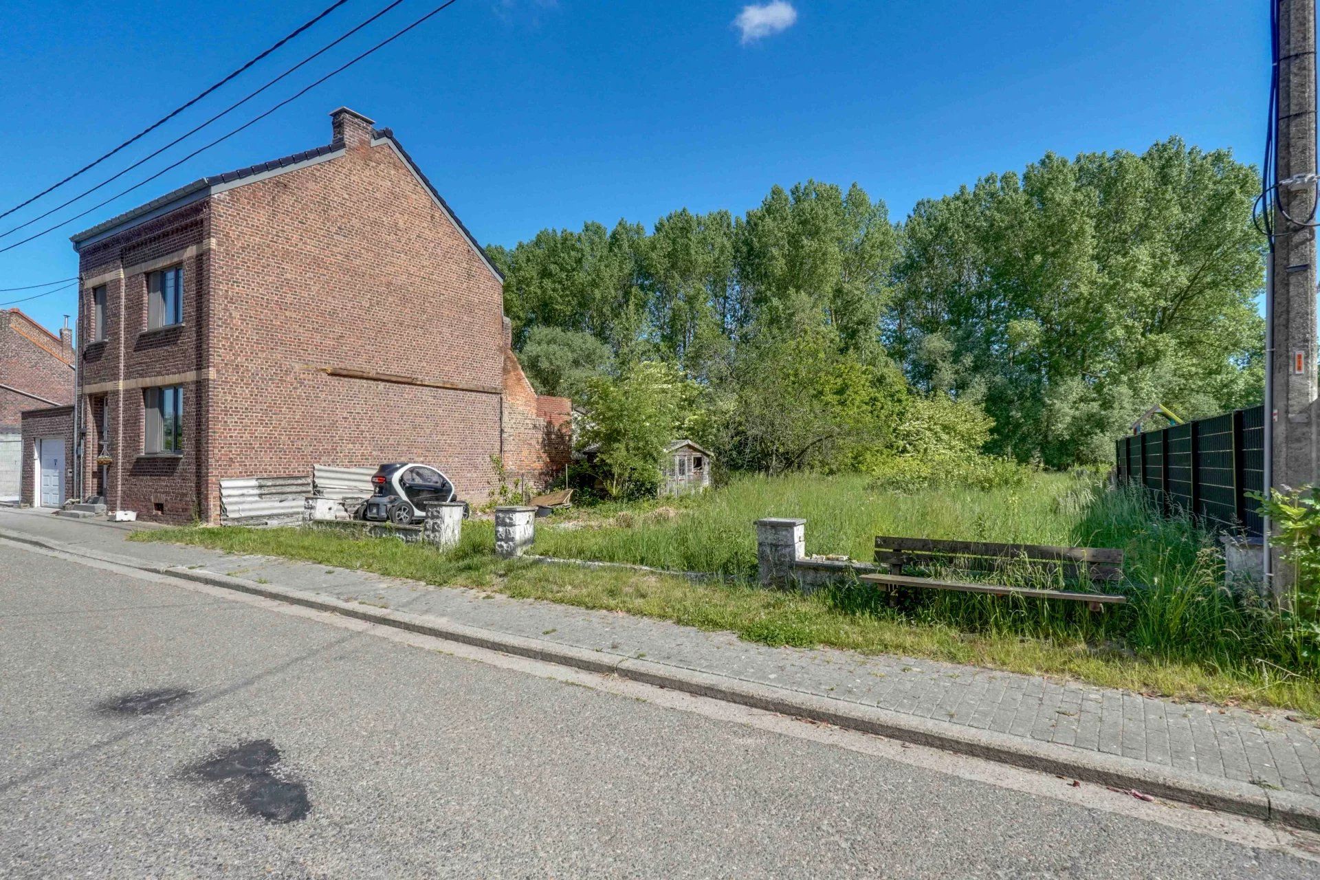 Rustig gelegen bouwgrond voor halfopen woning foto {{pictureIndex}}