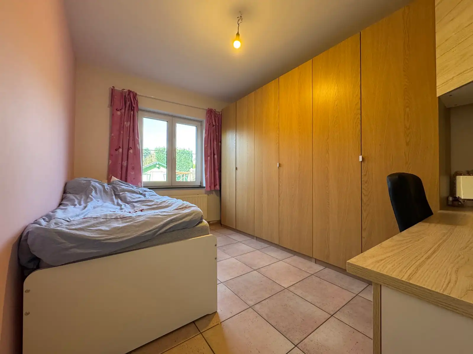 Gelijkvloers appartement met ruime privé tuin en garage foto 11