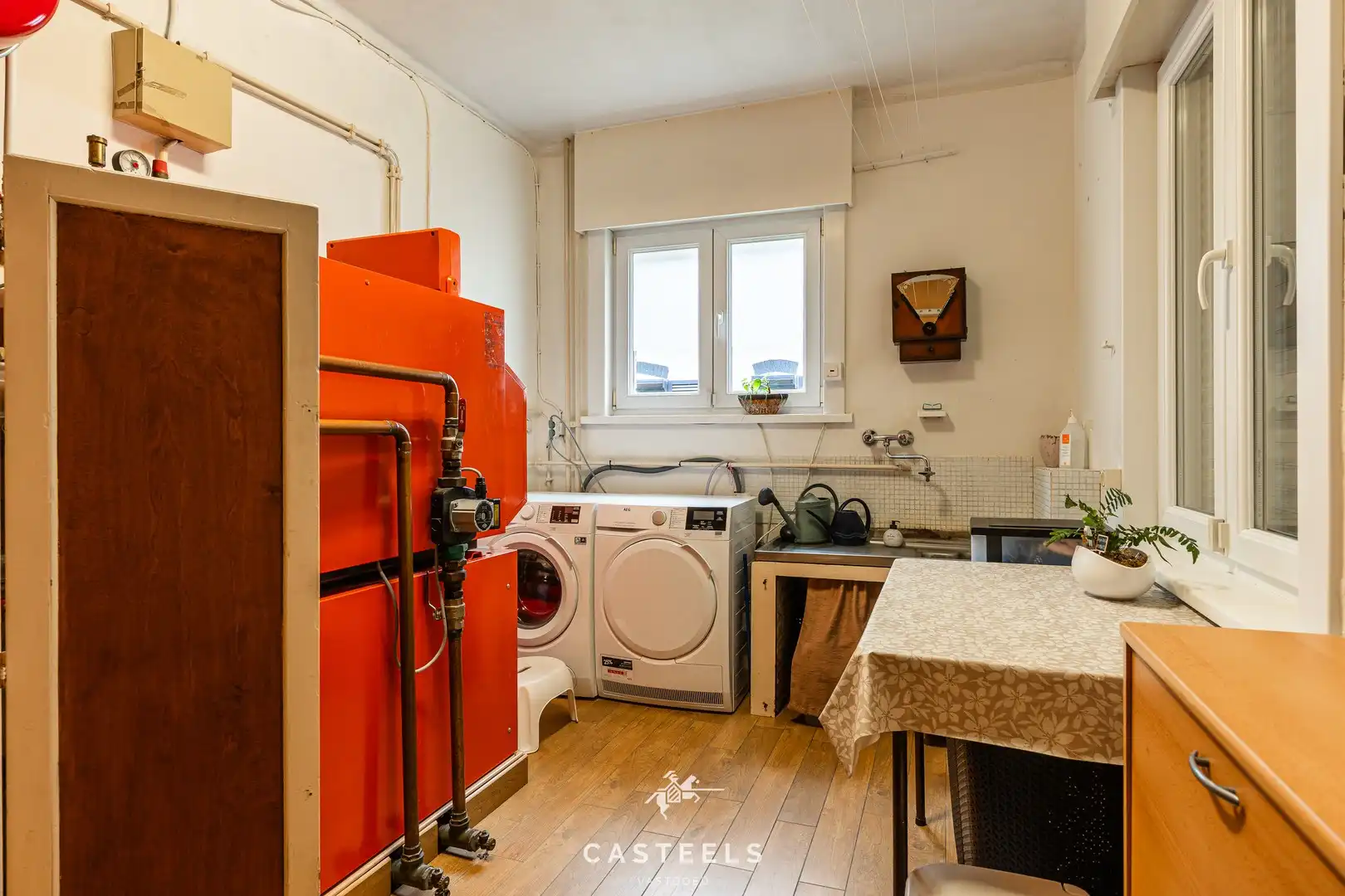 Ruime gezinswoning met zonnige tuin te koop in Lokeren foto 11