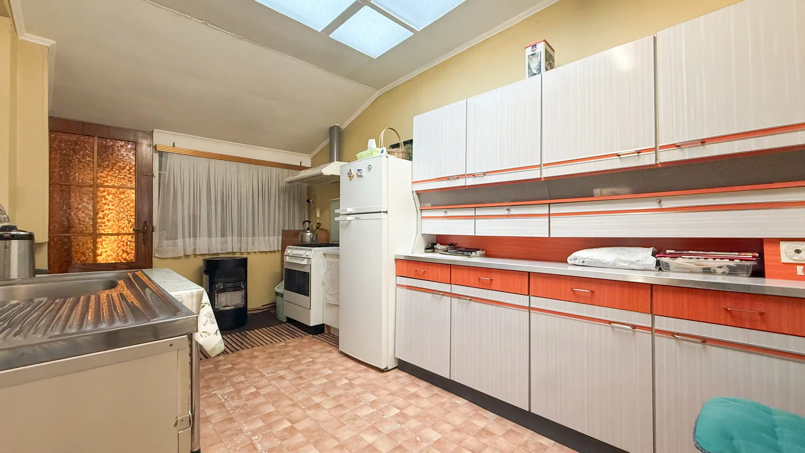 Op te frissen rijhuis met 3slpk + tuin in Sint-Truiden! foto 11