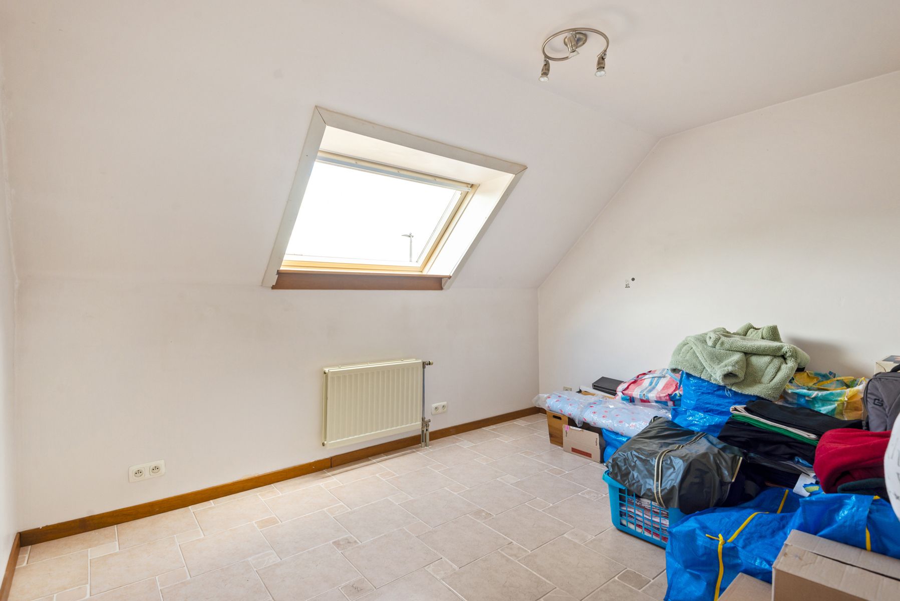 Gezellige eengezinswoning met 4 slaapkamers, tuin & garage! foto 10